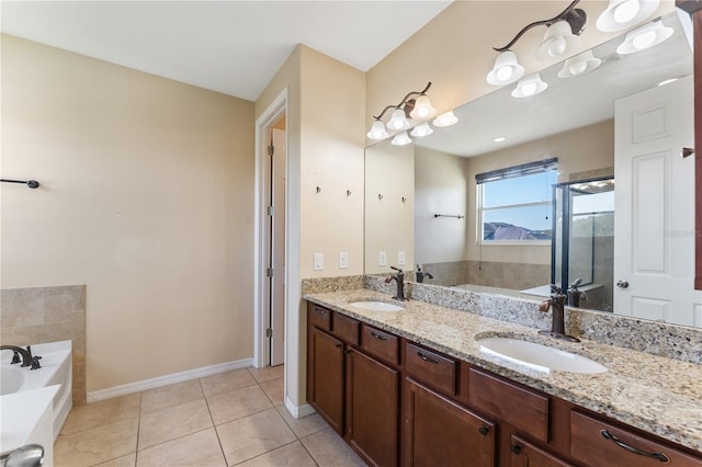 bathroom featuring vanity, shower with separate bathtub, and tile patterned floors