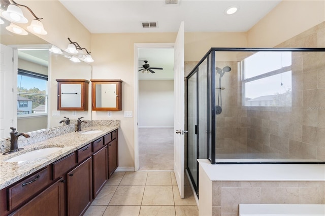 bathroom featuring vanity, tile patterned floors, ceiling fan, and an enclosed shower