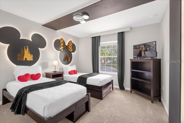 bedroom with light colored carpet