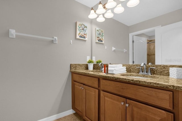 bathroom featuring vanity and walk in shower