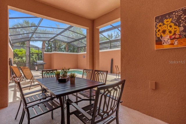 view of patio / terrace with a lanai