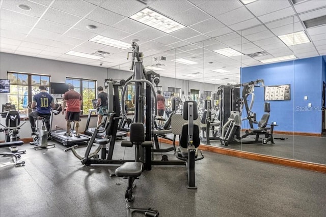 workout area with a drop ceiling