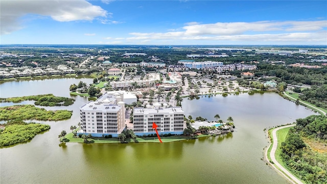 birds eye view of property featuring a water view