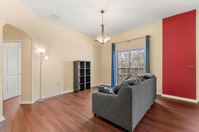 living room with dark wood-type flooring