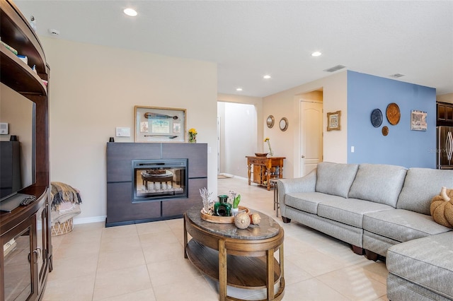 living room featuring light tile patterned floors