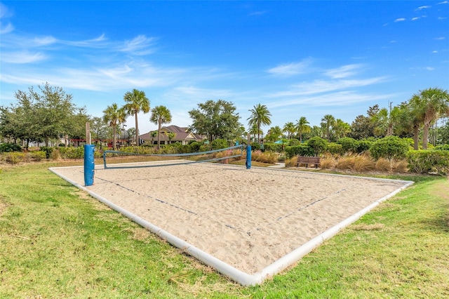 view of home's community with a yard and volleyball court