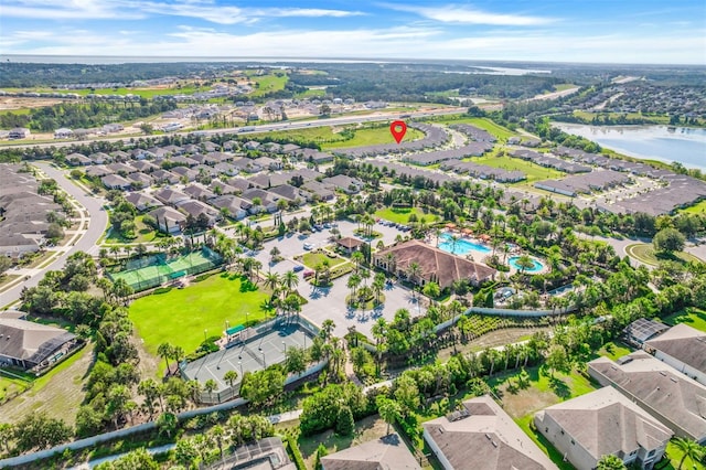 aerial view with a residential view and a water view