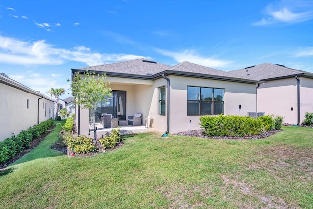 rear view of property featuring a patio area, stucco siding, an outdoor hangout area, and a lawn