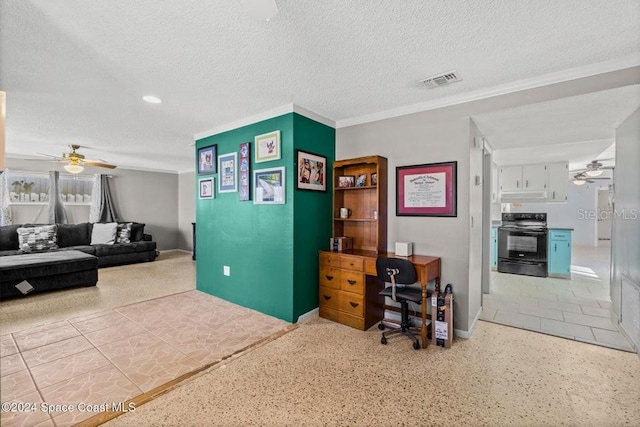 office with a textured ceiling and ceiling fan