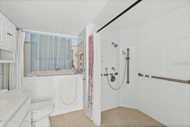 full bathroom featuring vanity, shower / tub combo, toilet, and tile patterned floors