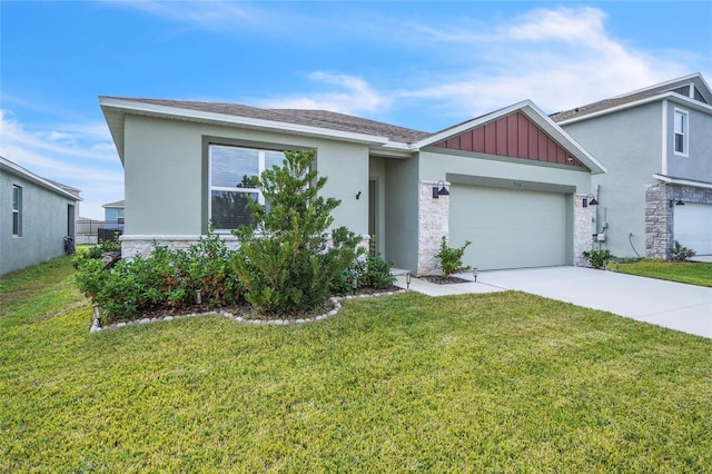 view of front of house featuring a garage and a front lawn