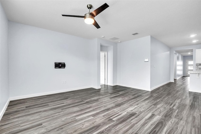 unfurnished room featuring hardwood / wood-style flooring and ceiling fan