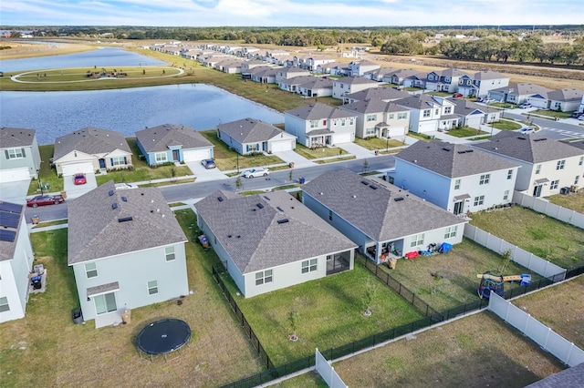 drone / aerial view featuring a water view