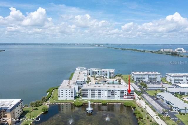 birds eye view of property featuring a water view