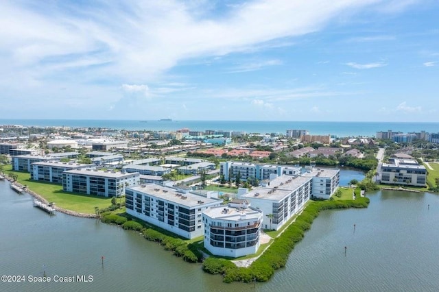 drone / aerial view featuring a water view