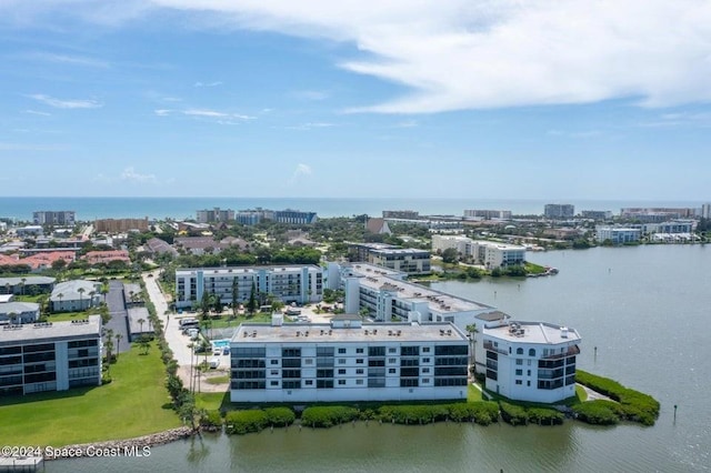 bird's eye view with a water view