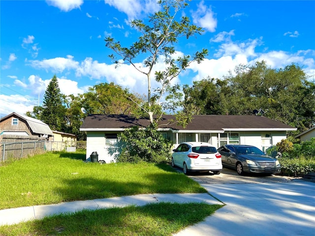 view of front facade with a front lawn