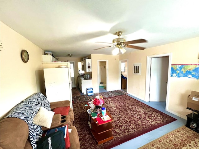 living room with ceiling fan