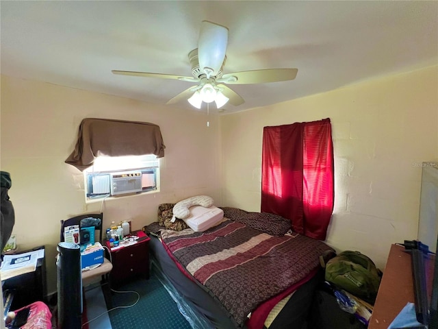 bedroom featuring cooling unit and ceiling fan