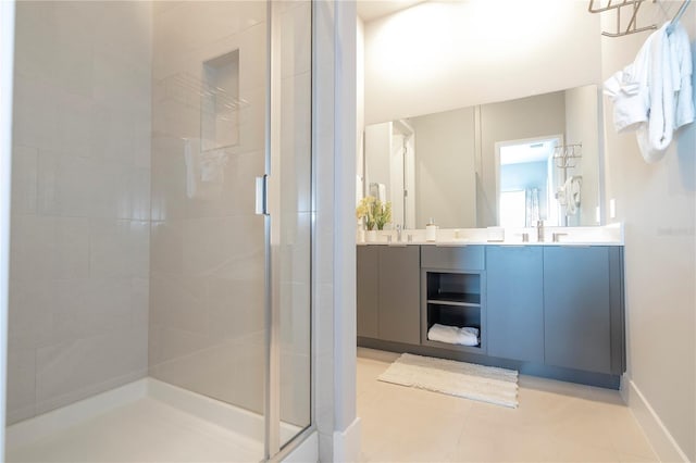 bathroom with vanity, tile patterned floors, and walk in shower