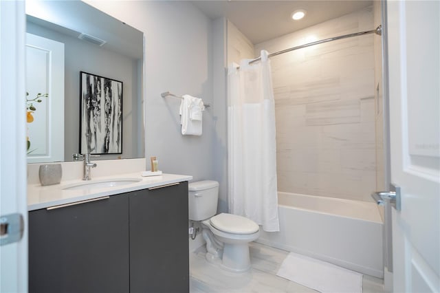 full bathroom featuring vanity, toilet, and shower / bath combo with shower curtain