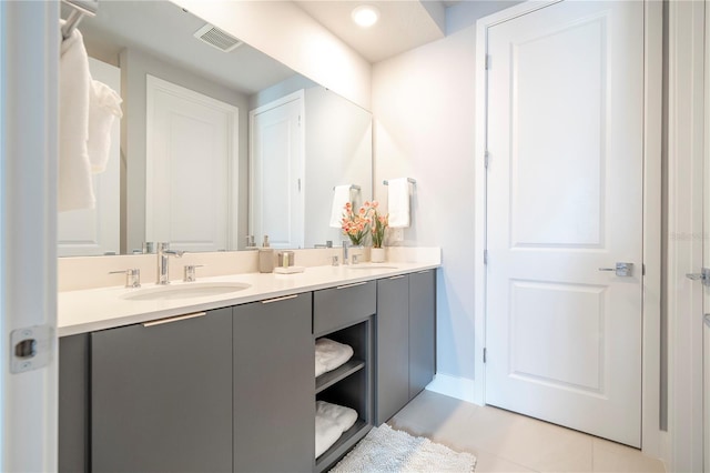 bathroom featuring vanity and tile patterned flooring