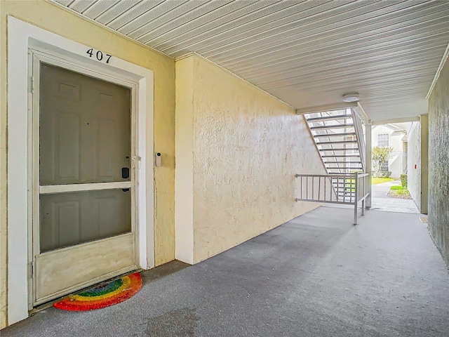 property entrance featuring covered porch