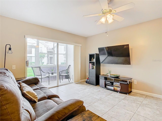 living room with ceiling fan and light tile patterned floors