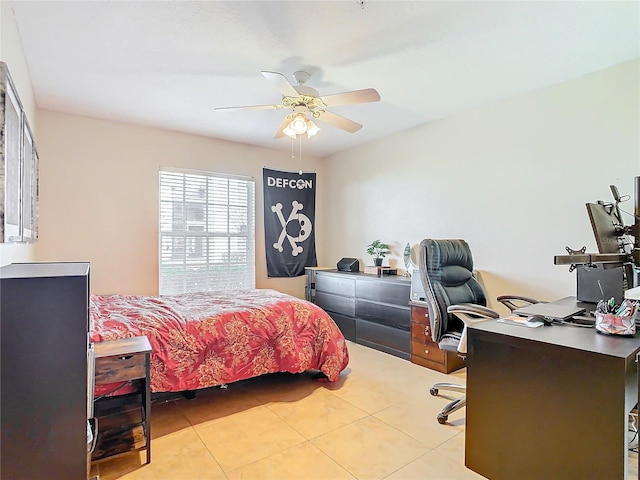 bedroom featuring ceiling fan and light tile patterned floors