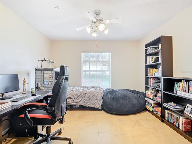 office space with tile patterned floors and ceiling fan