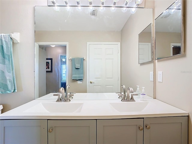 bathroom featuring vanity