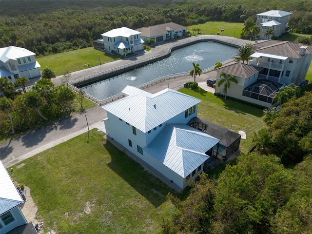 drone / aerial view featuring a water view