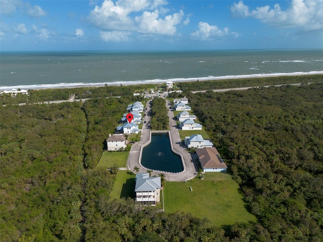 drone / aerial view with a view of the beach and a water view