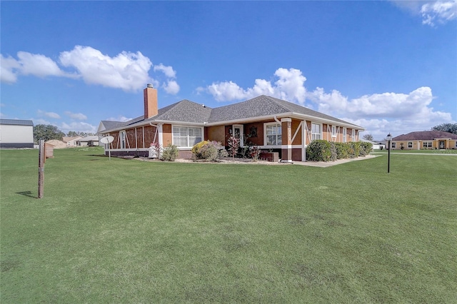 view of front of home with a front yard