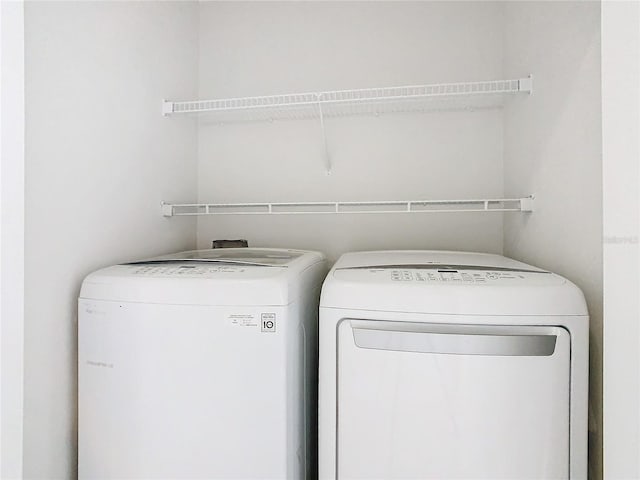 laundry area with washer and clothes dryer