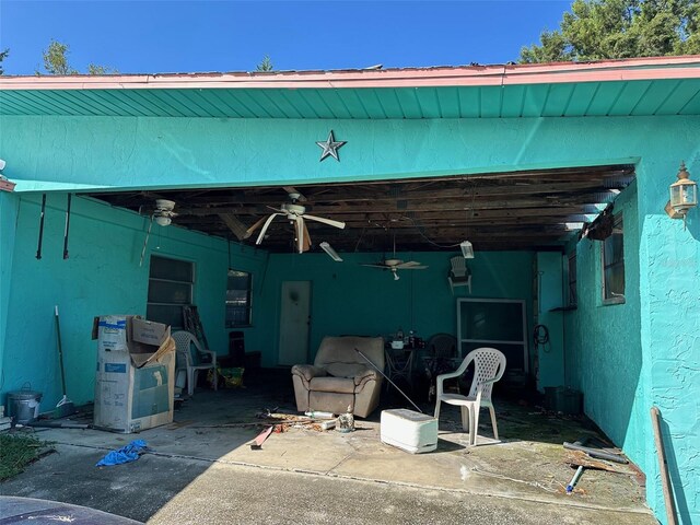 view of patio featuring ceiling fan