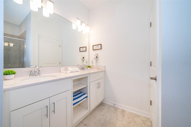 bathroom featuring vanity, an enclosed shower, and tile patterned floors