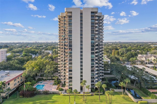 view of property featuring a community pool