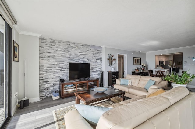 living room with ornamental molding and hardwood / wood-style floors