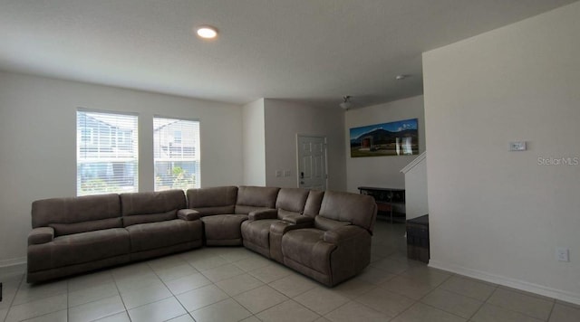 12500 Encore At Ovation Way, Winter Garden, FL 34787 - living room featuring baseboards and light tile patterned floors