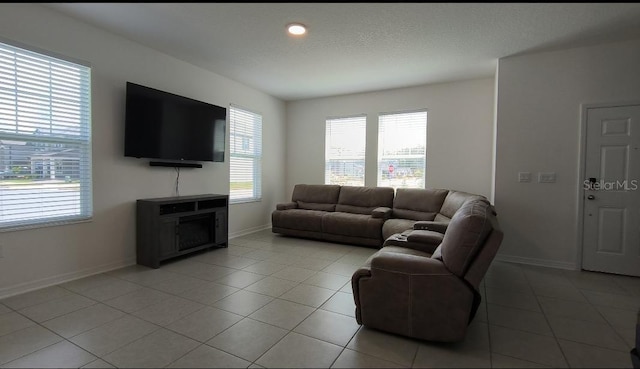 12500 Encore At Ovation Way, Winter Garden, FL 34787 - living area featuring plenty of natural light and light tile patterned floors
