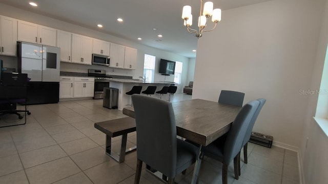 12500 Encore At Ovation Way, Winter Garden, FL 34787 - dining area featuring recessed lighting, a chandelier, and light tile patterned flooring