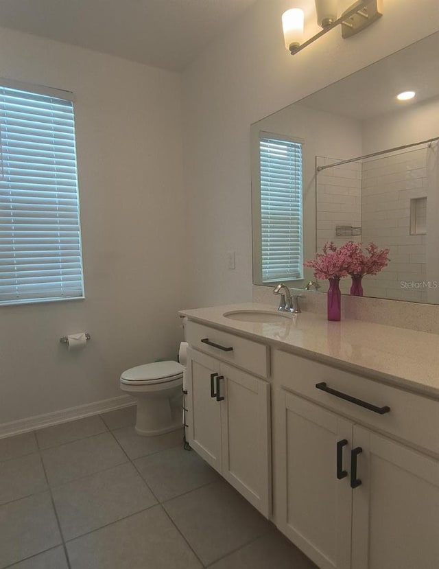 12500 Encore At Ovation Way, Winter Garden, FL 34787 - bathroom with tile patterned flooring, vanity, and a tile shower