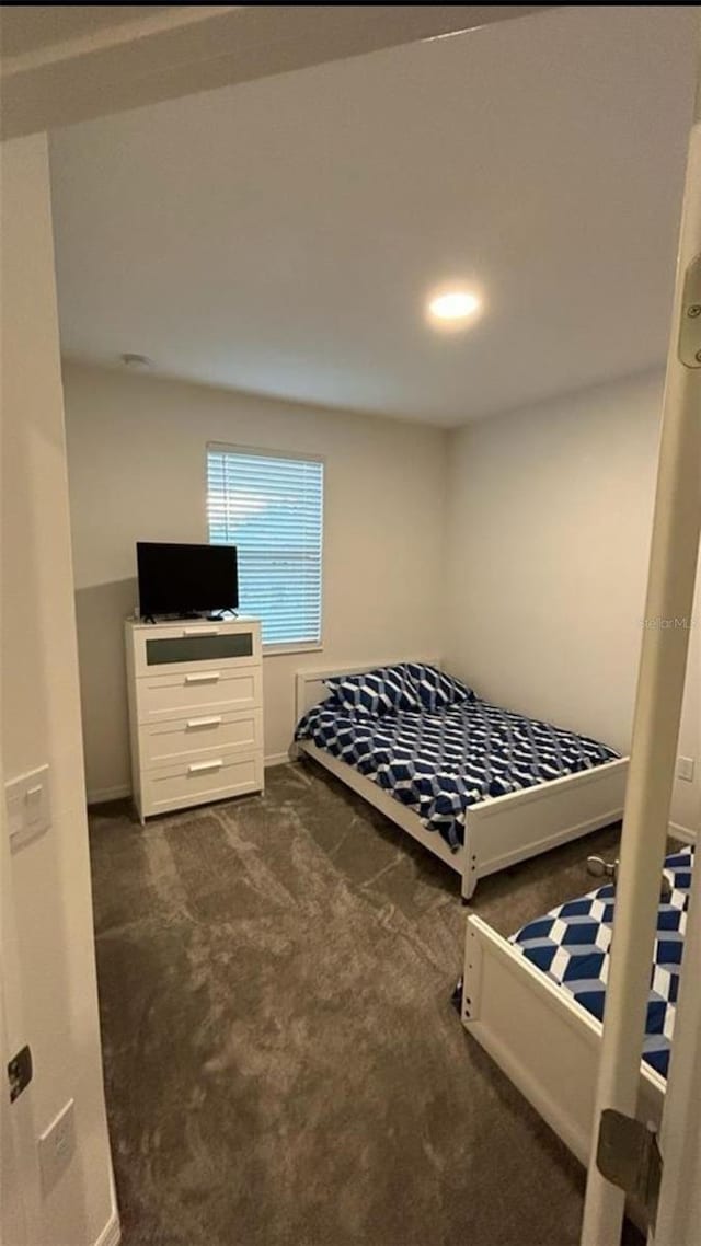 12500 Encore At Ovation Way, Winter Garden, FL 34787 - bedroom with dark colored carpet and baseboards