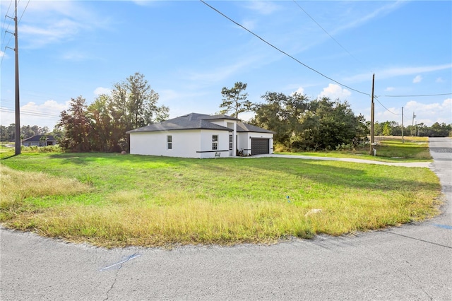 view of property exterior featuring a yard