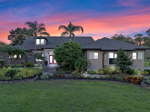 view of front of home featuring a yard