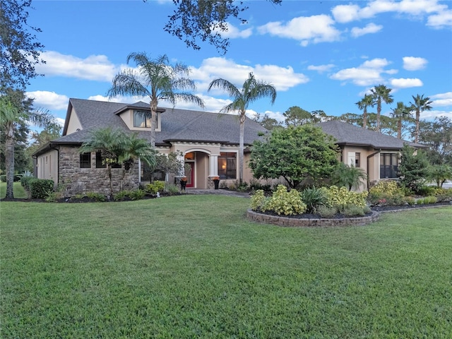 view of front of home featuring a front lawn