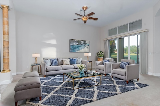 carpeted living room featuring ceiling fan