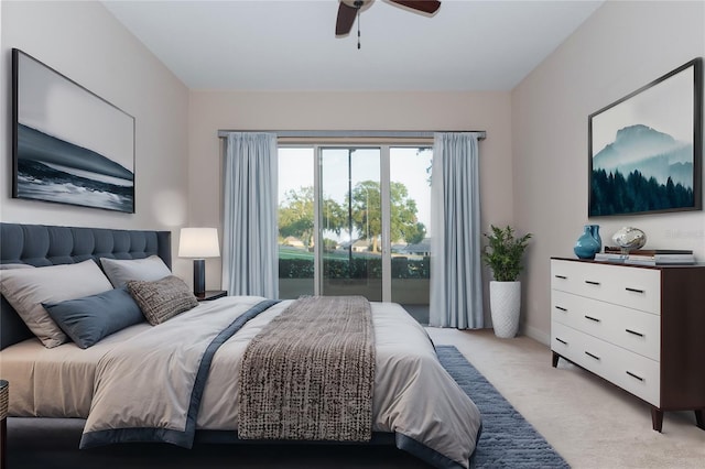 bedroom featuring ceiling fan and light carpet