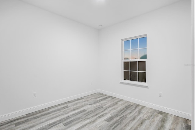 empty room with light wood-type flooring